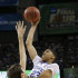 Kentucky's Anthony Davis, right, shoots over Kansas' Jeff Withey during the second half of the NCAA Final Four tournament college basketball championship game Monday, April 2, 2012, in New Orleans. (AP Photo/David J. Phillip)