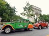 Citroen 2CV cars park by the Washington Square Park arch in New York City