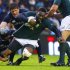 Scotland's Murray and Ross Ford tackle South Africa's Mtawarira during their rugby union match at Murrayfield Stadium in Edinburgh