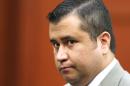 Zimmerman closes gun auction, doesn't identify winning bid