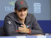 Roger Federer, of Switzerland, gestures while speaking during a news conference of the U.S. Open tennis tournament, Saturday, Aug. 27, 2011 in New York.  (AP Photo/Frank Franklin II)