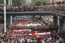 Anti-Japan protesters march in Chengdu, in southwestern China's Sichuan province, Sunday Aug. 19, 2012. Japanese activists swam ashore and raised flags Sunday on an island claimed by both Japan and China, fanning an escalating territorial dispute between the two Asian powers. (AP Photo) CHINA OUT