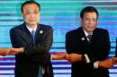 Chinese Premier Li Keqiang and Philippines President Rodrigo Duterte pose for photo during the ASEAN Plus Three Summit in Vientiane