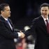 Louisville head coach Rick Pitino, left shakes hands with Kentucky head coach John Calipari before the first half of an NCAA Final Four semifinal college basketball tournament game Saturday, March 31, 2012, in New Orleans. (AP Photo/David J. Phillip)