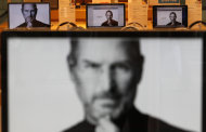 The monitors show the image of Apple co-founder Steve Jobs at an electronic shop in Seoul, South Korea, Thursday, Oct. 6, 2011. Jobs died on Wednesday at the age of 56. (AP Photo/Lee Jin-man)