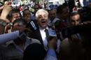 Presidential candidate Sabahi wait to vote in election in Cairo