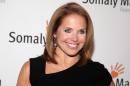 FILE - This Oct. 23, 2013 file photo shows TV host Katie Couric at the Somaly Mam Foundation Gala in New York. Couric is joining Yahoo to anchor a news program for the Internet company as it tries to expand its audience and sell more advertising. An announcement on Monday, Nov. 25, confirms recent published reports that Couric would diversify into online video programming after spending decades in broadcast television as a talk-show host and news anchor. The 56-year-old Couric will continue to host her daytime talk show, "Katie," on ABC even after she becomes Yahoo's "global anchor" beginning next year. (Photo by Andy Kropa/Invision/AP, File)