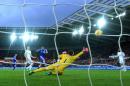 Chelsea's Diego Costa scores his side's third goal during the English Premier League match against Swansea at the Liberty Stadium, Swansea, Saturday Jan. 17, 2015. (AP Photo/PA, Nick Potts) UNITED KINGDOM OUT