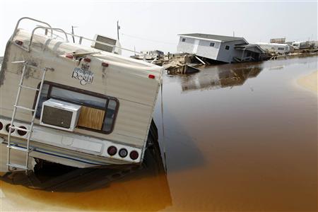A trailer sits on the beach at the North Beach Campground after being washed out by Hurricane Irene, at Cape Hatteras National Seashore in Rodanthe