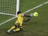 Zambia's goalkeeper Kennedy Mweene saves the winning penalty kick by Ivory Coast's defender Kolo Toure to win the African Cup of Nations tournament at the Stade De L'Amitie Stadium in Gabon's capital Libreville