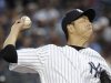 New York Yankees' Kuroda pitches to the Boston Red Sox in their MLB game in New York