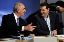 Former Prime Minister and leader of the Syriza party Alexis Tsipras (R) and leader of the conservative New Democracy party Vangelis Meimarakis (L) before a debate in Athens on September 9, 2015
