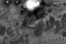 A video grab made on October 1, 2015, shows footage made available on the Russian Defence Ministry's official website, purporting to show an airstrike in Syria
