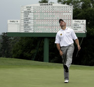 Lee Westwood, of England, reacts after missing a birdie putt on the 18th green during the first round of the Masters golf tournament Thursday, April 5, 2012, in Augusta, Ga. (AP Photo/Matt Slocum)
