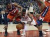 Toronto Raptors Lowry is fouled by Washington Wizards Wall during the first half of their NBA basketball game in Toronto