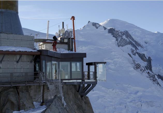 View of the &#39;Step into the Void&#39; installation at the Aiguille du Midi mountain peak above Chamonix, in the French Alps