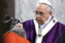 Pope Francis puts ashes on a cardinal's head as he leads the Ash Wednesday mass at the Santa Sabina Basilica, in Rome, Wednesday, Feb. 18, 2015. The Ash Wednesday marks the beginning of Lent, a solemn period of 40 days of prayer and self-denial leading up to Easter. (AP Photo/Gabriel Bouys, pool)