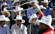 Prince William, The Duke and Duchess of Cambridge, watches the annual Calgary Stampede parade in Calgary, Alberta, Canada on Friday, July 8, 2011. (AP Photo/The Canadian Press, Nathan Denette)