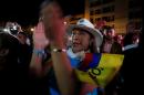 Supporters of "No" vote celebrate after the nation voted "No" in a referendum on a peace deal between the government and FARC rebels, in Bogota, Colombia