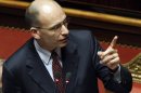 Italian PM Letta gestures at the Upper house of the parliament in Rome
