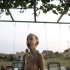 In this photo taken on Wednesday, Sept. 14, 2011,  David Petrovic, 4, stands in his garden as silverware sticks on his chest in Gornji Milanovac, some 100 kilometers (60 miles) south of Belgrade, Serbia. Serb cousins David and Luka are poles apart from other kids, for when it comes to metalwear, everything sticks. The two boys from the central Serbian town of Gornji Milanovac have a rare ability to attract metal objects, acting much like human magnets. (AP Photo/ Marko Drobnjakovic)