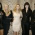 FILE- In this Jan. 14, 2008 file photo, the Spice Girls, from left, Melanie Brown, Emma Bunton, Geri Halliwell  Melanie Chishlom and Victoria Beckham pose backstage prior to the start of the Roberto Cavalli Fall/Winter 2008/2009 men's collection fashion show, in Milan, Italy, (AP Photo/Luca Bruno, File)