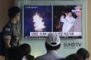 FILE - In this Thursday, Aug. 25, 2016, file photo, a South Korean army soldier watches a TV news program showing images published in North Korea's Rodong Sinmun newspaper of North Korea's ballistic missile believed to have been launched from underwater and North Korean leader Kim Jong-un, at Seoul Railway station in Seoul, South Korea. While the global economy will dominate at the summit of the Group of 20 industrialized and emerging-market nations, politics and security issues form the backdrop to the gathering of world leaders in the eastern Chinese city of Hangzhou. (AP Photo/Ahn Young-joon, File)