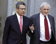 Former Goldman Sachs director Rajat Gupta, left, and his attorney Gary P. Naftalis, leave federal court in New York, Friday, June 15, 2012. Gupta, accused of feeding confidential information to a corrupt hedge fund manager, has been convicted of conspiracy and three counts of securities fraud. (AP Photo/Richard Drew)