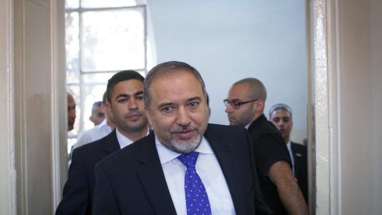 Avigdor Lieberman arrives at the Magistrates Court in Jerusalem on November 6, 2013 before his acquittal in his fraud trial