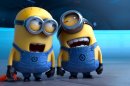 FILE - This file photo provided by Universal Pictures shows the minion characters in the film "Despicable Me 2." Domestic box office numbers so far on this long Fourth of July holiday weekend are suggesting the the animated minions of family favorite, with a price tag one third of what 