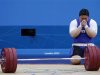 South Korea's Jang Mi-Ran reacts after failing to lift on her third attempt in the women's +75kg group A clean and jerk weightlifting competition at the ExCel venue during the London 2012 Olympic Games
