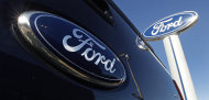 <p>               FILE - This Oct. 25, 2011, file photo, shows a Ford logo,on the tailgate of a pick-up truck, and on a Ford dealership sign at Salem Ford in Salem, N.H.  Ford Motor Co. said Friday, April 27, 2012, its net income fell by 45 percent in the first quarter as European sales plummeted and the company paid higher taxes. It earned $1.4 billion, or 35 cents per share, in the first quarter.  (AP Photo/Charles Krupa, File)