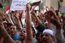 Supporters of the Muslim Brotherhood take part in a protest at Tahrir Square in Cairo