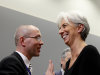 FILE - In this Oct. 19, 2010 file picture, then  French Finance Minister Christine Lagarde, right, speaks with German Deputy Finance Minister Joerg Asmussen during a round table meeting of EU finance ministers at the Kiem Center in Luxembourg. Germany's finance minister said Saturday Sept. 10, 2011 he wants his long-serving deputy to succeed Juergen Stark on the executive board of the European Central Bank.  Wolfgang Schaeuble said he told the head of the Eurogroup that he wanted Joerg Asmussen to succeed Stark. He added that he expects Asmussen to join the ECB by the end of the year. Asmussen, a member of the opposition Socialist party, has been a key official in the eurozone's fight against the debt crisis. Stark unexpectedly resigned from the ECB's executive board Friday in a move that analysts say was triggered by disagreement over the bank's bond purchases. Asmussen's appointment still needs to be signed off by all other eurozone finance ministers. (AP Photo/Virginia Mayo,File)