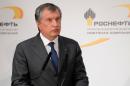 FILE - In this Friday, Oct. 11, 2013 file photo CEO of state-controlled Russian oil company Rosneft Igor Sechin commissions new equipment at the Rosneft oil refinery in the Black Sea port of Tuapse, southern Russia. The U.S. Department of the Treasury on Monday, April 28, 2014, designated seven Russian government officials, including two key members of the Russian leadership's inner circle, and 17 entities pursuant to Executive Order (E.O.) 13661. E.O. 13661 authorizes sanctions on, among others, officials of the Russian Government and any individual or entity that is owned or controlled by, that has acted for or on behalf of, or that has provided material or other support to, a senior Russian government official. Sechin is on the list. (AP Photo/RIA-Novosti, Alexei Nikolsky, Presidential Press Service, File)