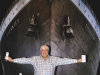 In this April 25, 2012 photo provided by Crook Publicity, Australian billionaire Clive Palmer poses in front of an artist impression of the Titanic ll at MGM Studios in Los Angeles, Ca. Palmer said Monday, April 30, 2012, that he'll build a high-tech replica of the Titanic at a Chinese shipyard and its maiden voyage in late 2016 will be from England to New York, just like its namesake planned. (AP Photo/Crook Publicity) EDITORIAL USE ONLY