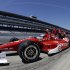 In this photo taken with a fisheye lens, Scott Dixon, of New Zealand, pulls out of the pit area during practice for the Indianapolis 500 auto race at the Indianapolis Motor Speedway in Indianapolis, Monday, May 13, 2013. (AP Photo/Darron Cummings)