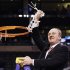 Ohio State head coach Thad Matta celebrates as he cuts down the net after his team defeated Syracuse 77-70 in the East Regional final game in the NCAA men's college basketball tournament, Saturday, March 24, 2012, in Boston. (AP Photo/Elise Amendola)