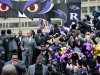 Baltimore Ravens linebacker Terrell Suggs and receiver Anquan Boldin, back, arrive at a send-off rally Monday, Jan. 28, 2013 in Baltimore. The team was leaving for New Orleans to play against the San Francisco 49ers in the Super Bowl. (AP Photo/Steve Ruark)