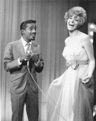 FILE - In this Jan. 6, 1967 file photo, Sammy Davis Jr. and Kaye Stevens perform on a TV show. Stevens a singer, actress, and longtime South Florida resident who was a frequent guest on Johnny Carson's "The Tonight Show," has died at a central Florida hospital. She was 79. (AP Photo, File)