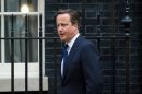 British Prime Minister David Cameron leaves 10 Downing Street in central London on August 29, 2013