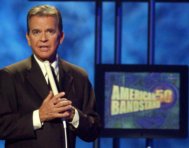 FILE - In this April 20, 2002 file photo, Dick Clark, host of the American Bandstand television show, introduces entertainer Michael Jackson on stage during taping of the show's 50th anniversary special in Pasadena, Calif. Clark, the television host who helped bring rock `n' roll into the mainstream on "American Bandstand," died Wednesday, April 18, 2012 of a heart attack. He was 82. (AP Photo/Kevork Djansezian, File)