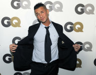 FILE - In this Nov. 17, 2010 photo, Mike "The Situation" Sorrentino poses at GQ magazine's 2010 "Men of the Year" party in Los Angeles. Abercrombie & Fitch Co. is offering money to Mike "The Situation" Sorrentino and his fellow "Jersey Shore" cast members — so they'll stop wearing the brand on the show. The clothing company says in a news release posted Tuesday, Aug. 16, 2011, that it's concerned that having Sorrentino seen in its clothing could cause "significant damage" to the company's image. The Ohio-based retailer says it has offered a "substantial payment" to Sorrentino and producers of the MTV show so he'll wear something else. (AP Photo/Chris Pizzello)