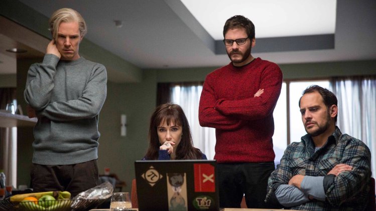 This film publicity image released by Toronto International Film Festival shows, from left, Benedict Cumberbatch, Carice van Houten, Daniel Bruhl and Moritz Bleibtreu in a scene from "The Fifth Estate," being shown during the Toronto International Film Festival. (AP Photo/Toronto International Film Festival, Frank Connor)
