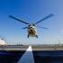 A helicopter lands on the deck of the Dutch ship Hr. Ms. Holland at the Dan Helder naval port, near to where the Maria sank, leaving three sailors missing