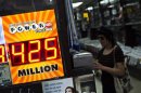A woman buys a Powerball lottery ticket at a convenience store in New York