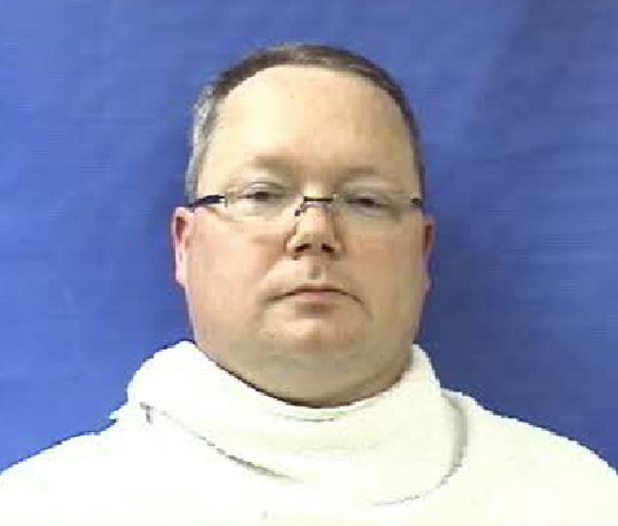 This photo provided by the Kaufman County Sheriff's Office shows Eric Williams. Williams was admitted to the Kaufman County Jail, in Kaufman, Texas, early Saturday, April 13, 2013, and charged with making a "terroristic threat." Federal and local authorities searched Williams' home Friday as part of an investigation into the deaths of District Attorney Mike McLelland and his wife, Cynthia. (AP Photo/Kaufman County Sheriff's Office)