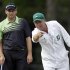 Sergio Garcia, of Spain, listens to his caddie Greg Hearmon on the 14th green during the first round of the Masters golf tournament Thursday, April 11, 2013, in Augusta, Ga. (AP Photo/David Goldman)