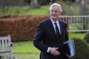 European Union Commissioner for Internal Market and Services Michel Barnier arrives to attend a European People's Party meeting on Defence, in Meise on December 19, 2013