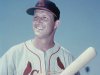 FILE - In this March 1958 file photo, St. Louis Cardinals' Stan Musial, with bat in hand, poses for a photo during spring training baseball in Florida. Musial, one of baseball's greatest hitters and a Hall of Famer with the Cardinals for more than two decades, died Saturday, Jan. 19, 2013, the team announced. He was 92. (AP Photo/File)